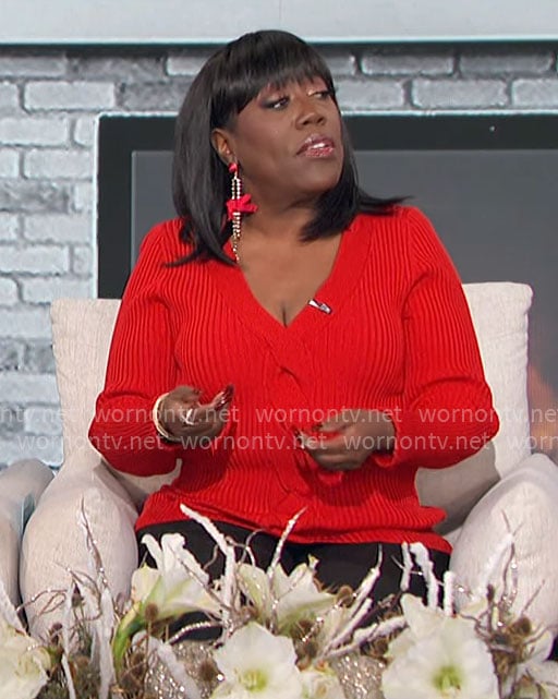 Sheryl’s red v-neck cable front sweater on The Talk