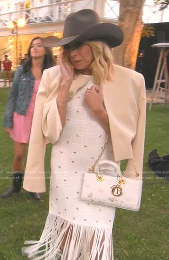 Sutton’s white fringed dress on The Real Housewives of Beverly Hills
