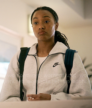 Whitney’s grey cropped Nike jacket on The Sex Lives of College Girls