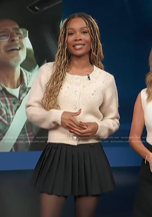 Zuri’s embellished beige cardigan on Access Hollywood
