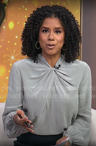 Adriana Diaz’s sage green twist-neck blouse on CBS Mornings