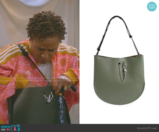 All Saints Beaumont Snake Embossed Leather Hobo Bag in Sage Green worn by Lucretia Turner (Wanda Sykes) on The Upshaws
