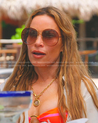 Britani’s orange round sunglasses on The Real Housewives of Salt Lake City