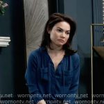 Elizabeth’s teal blue tie neck top with pockets on General Hospital