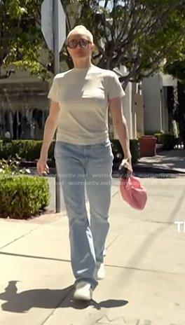 Erika’s pink knot bag and jeans on The Real Housewives of Beverly Hills