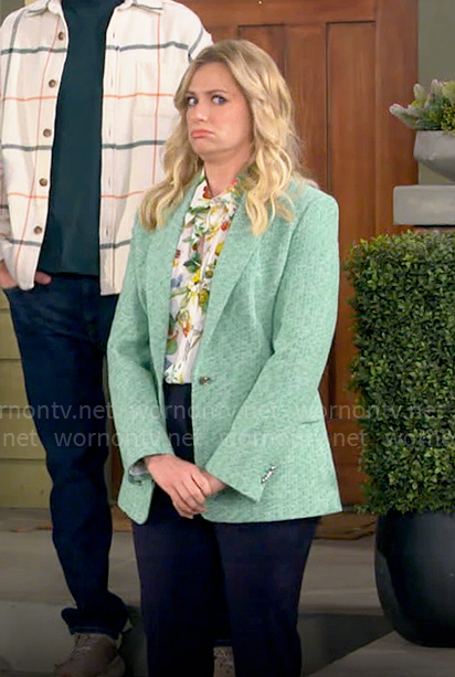 Gemma’s floral button down shirt and green tweed blazer on The Neighborhood