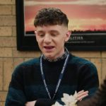 Jacob’s blue stripe sweater on Abbott Elementary