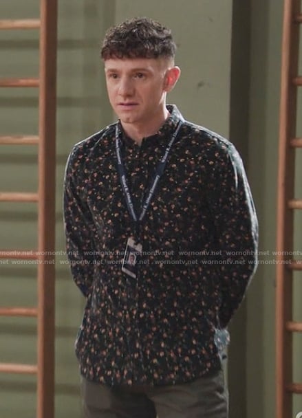 Jacob’s black floral print shirt on Abbott Elementary