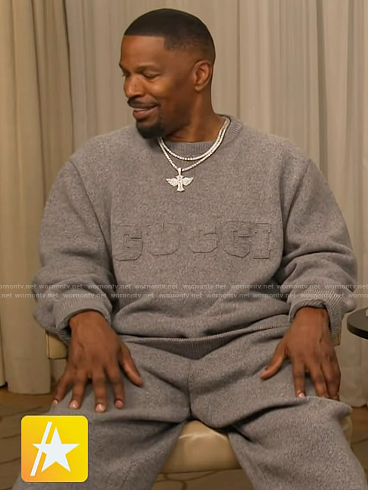 Jamie Foxx’s gray Gucci embroidered sweatshirt on Access Hollywood