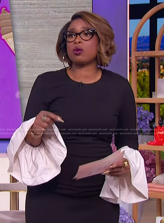 Jennifer’s black contrast bell sleeve dress on The Jennifer Hudson Show