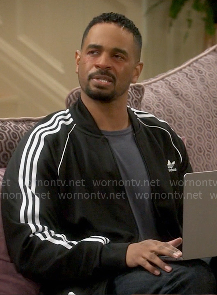 Junior’s black Adidas track jacket on Poppas House