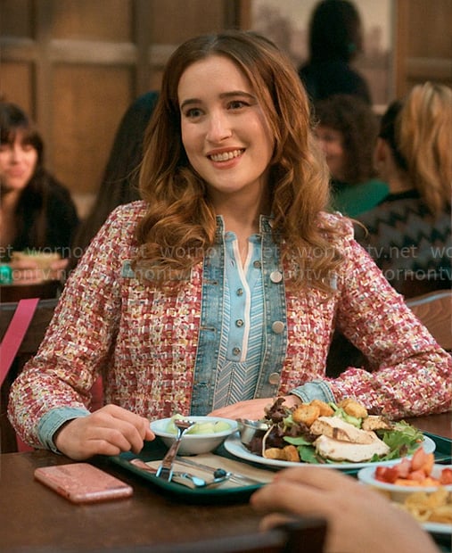 Kacey’s red tweed and denim jacket with blue polo top on The Sex Lives of College Girls