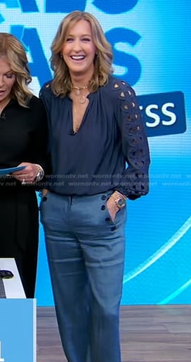 Lara’s navy embroidered blouse and blue pants on Good Morning America