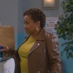 Lucretia’s brown leather moto jacket on The Upshaws