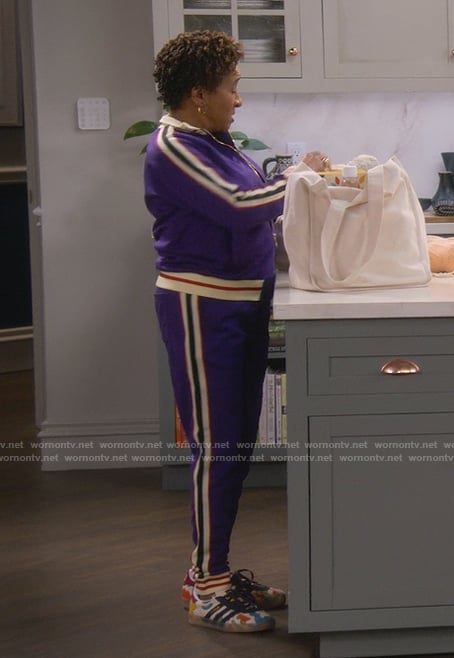 Lucretia’s purple sleeve stripe tracksuit on The Upshaws