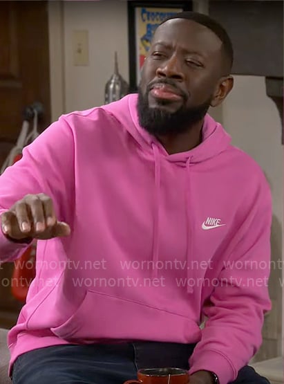 Malcolm’s pink Nike hoodie on The Neighborhood