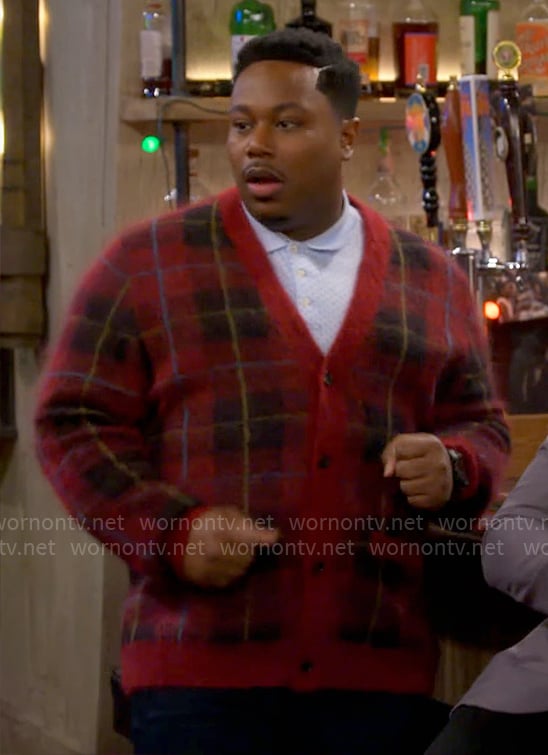 Marty’s red plaid cardigan on The Neighborhood