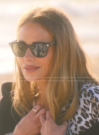 Dorit’s black sunglasses on The Real Housewives of Beverly Hills