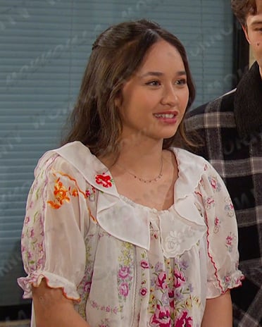 Sophia’s white floral print blouse on Days of our Lives