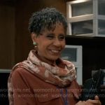 Stella’s rust brown button down shirt and printed scarf on General Hospital