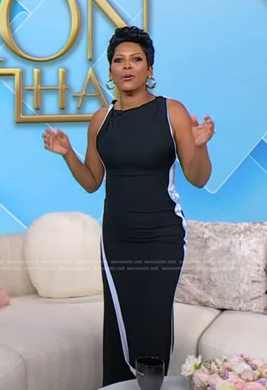 Tamron’s navy sleeveless dress on Tamron Hall Show