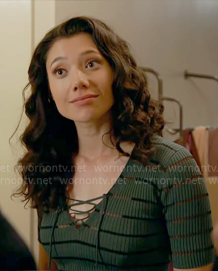 Violet’s green rib knit lace-up top on Chicago Fire
