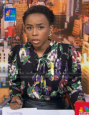 Zinhle’s black floral print tie neck blouse on NBC News Daily