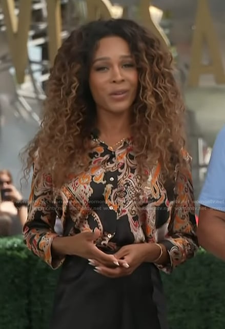 Zuri’s black paisley print blouse on Access Hollywood