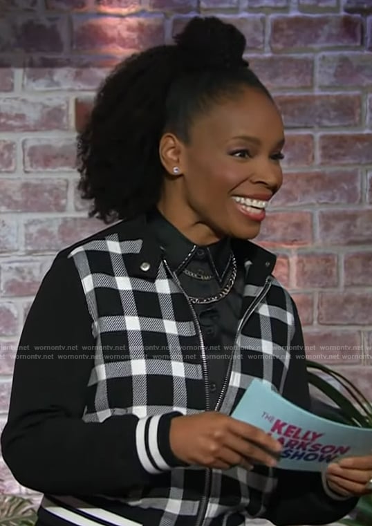 Amber Ruffin’s check print bomber jacket on The Kelly Clarkson Show
