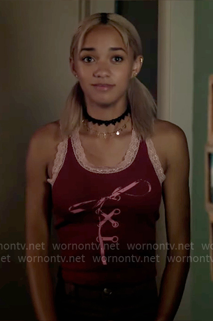 Ava’s red lace-trim bow graphic tank top on High Potential