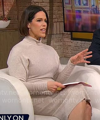 Dana Jacobson’s beige turtleneck sweater dress on CBS Mornings