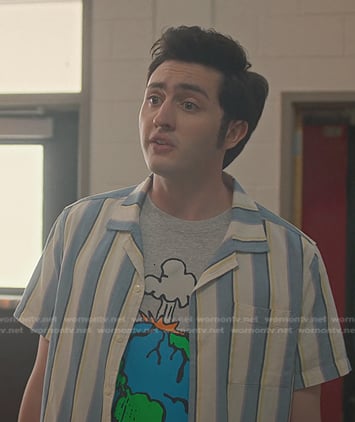 Demetri’s grey graphic print tee and striped shirt on Cobra Kai