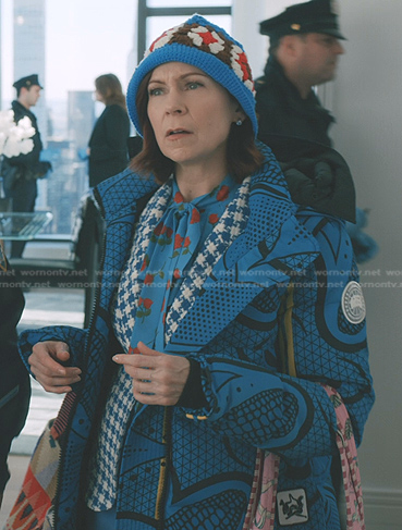 Elsbeth’s blue houndstooth blazer and print down coat on Elsbeth