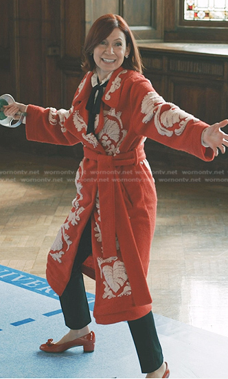 Elsbeth’s red floral wrap coat on Elsbeth