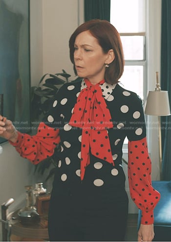 Elsbeth’s polka dot collared sweater and tie neck blouse on Elsbeth