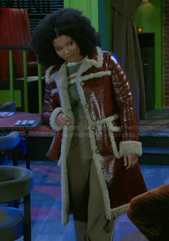 Eva’s leather coat with sherpa trims on Beyond the Gates