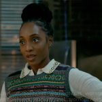 Faith’s white embroidered shirt and fair isle vest on Will Trent