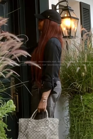 Garcelle’s black shirt and baseball cap on The Real Housewives of Beverly Hills