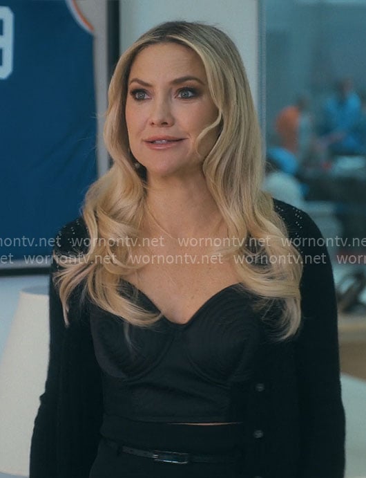 Isla’s black bustier top and pencil skirt on Running Point