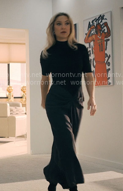 Isla’s black top and satin ruched skirt on Running Point