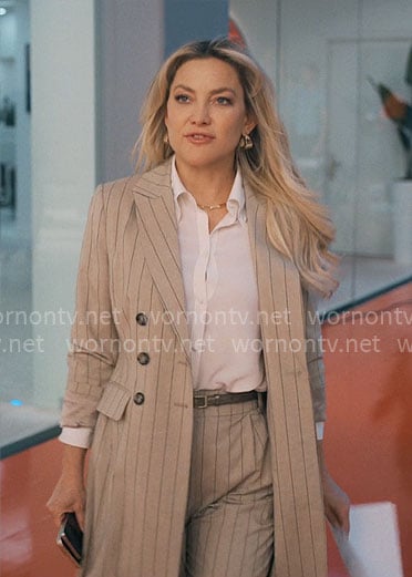 Isla’s grey pinstripe coat and pants on Running Point