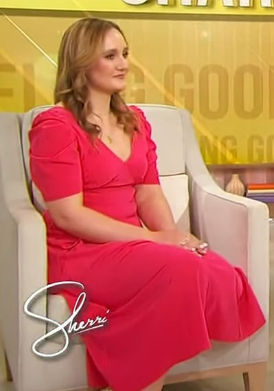 Julia Gallow’s pink puff sleeve dress on Sherri