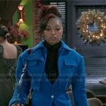 Kat’s blue layered coat on Beyond the Gates