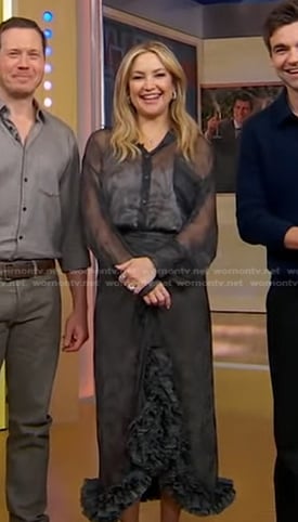 Kate Hudson’s black print sheer blouse and ruffle trim skirt on Good Morning America
