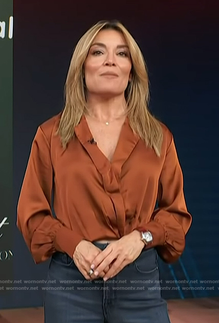 Kit’s brown satin top on Access Hollywood