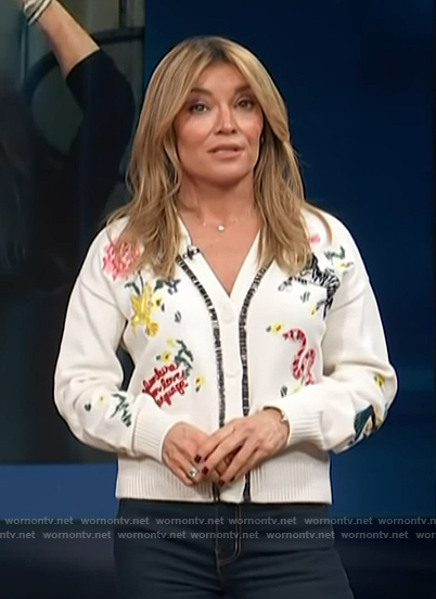Kit’s white animal embroidered cardigan on Access Hollywood
