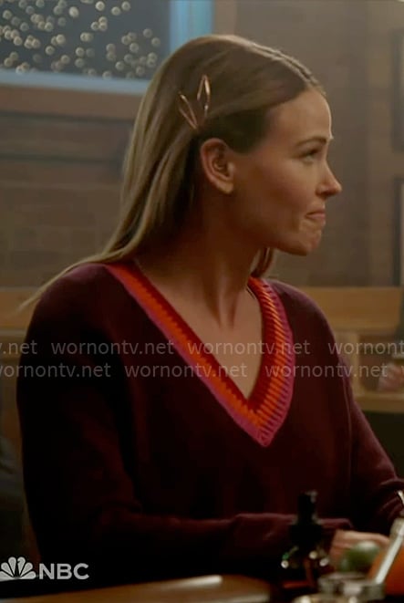 Lyla’s burgundy sweater with stripe v-neckline on Chicago Fire