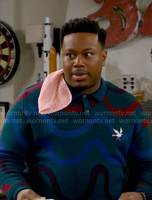 Marty’s green wavy print bird sweater on The Neighborhood