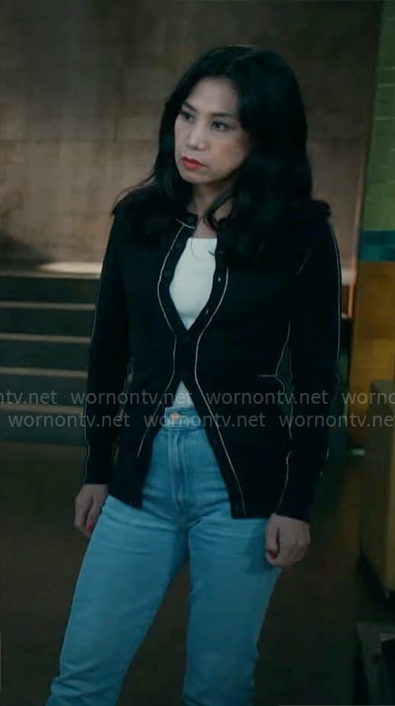 Mel’s black contrast trim cardigan on The Equalizer
