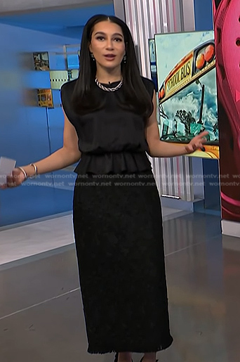 Morgan’s black peplum top and lace pencil skirt on NBC News Daily